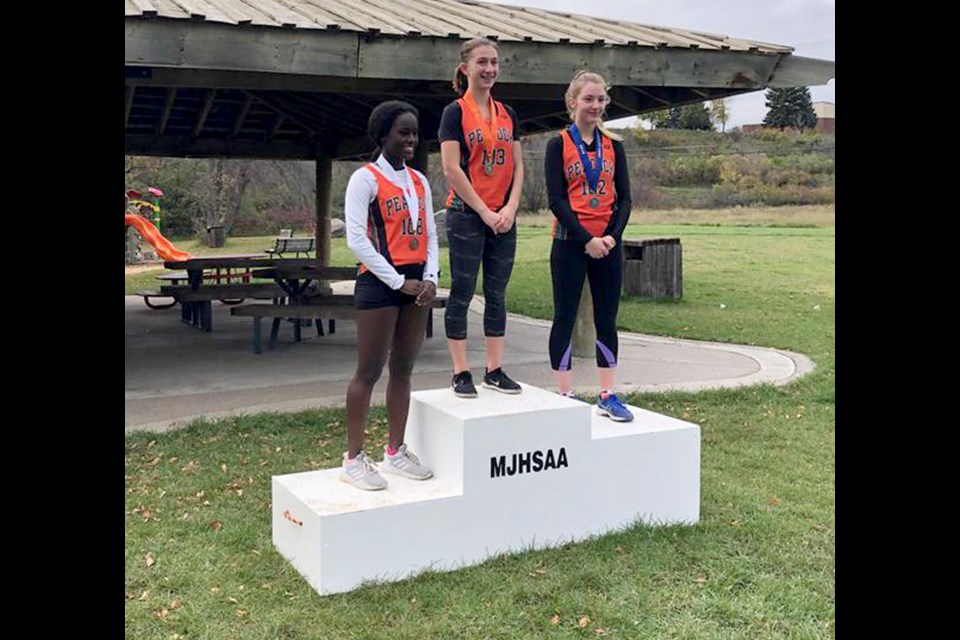 It was a Peacock sweep in the senior girls division, with long-time teammates Alyssa Roney winning gold, Caitlyn Johnson silver and Miheret Cridland bronze.