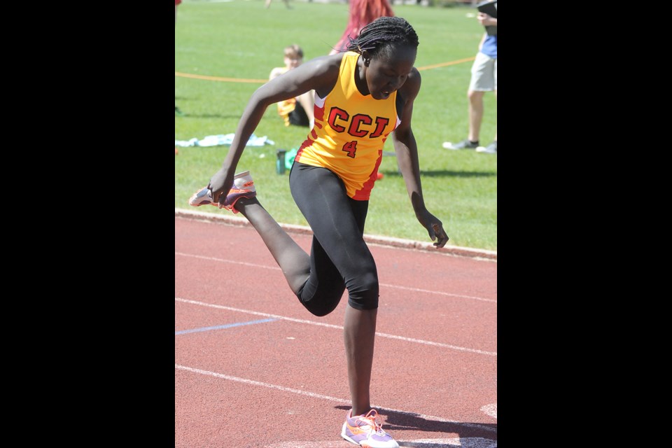 Central’s Akuol Riak crosses the line to set a new city championship record of 1:02.25 in the 400 metres.