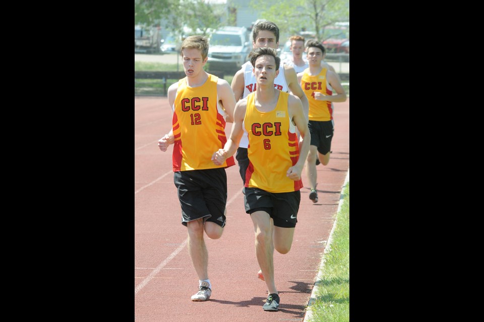 Central distance specialist Kal McGillis (right) would go on to win the senior boys 1,500 metres in a time of 4:32.6, just ahead of Morgan Kilgour (left) in third and second place finisher Sam Moyse of Vanier.