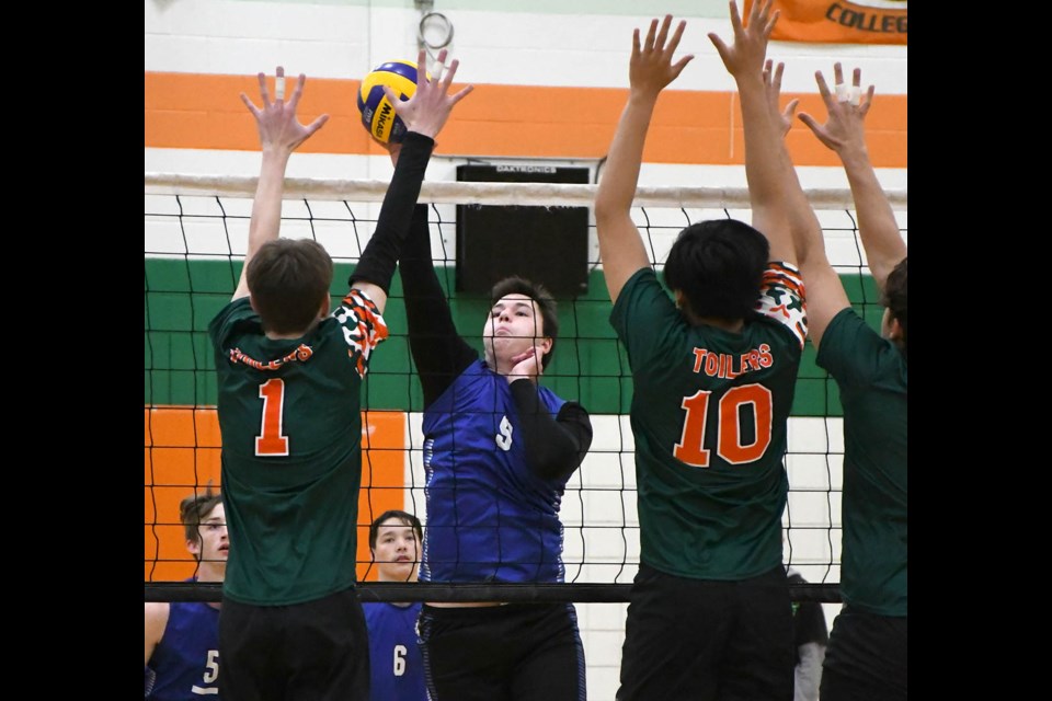 Action from the Moose Jaw high school boys volleybal league quarter-final between the Peacock Toilers and Riverview Royals on Tuesday night.