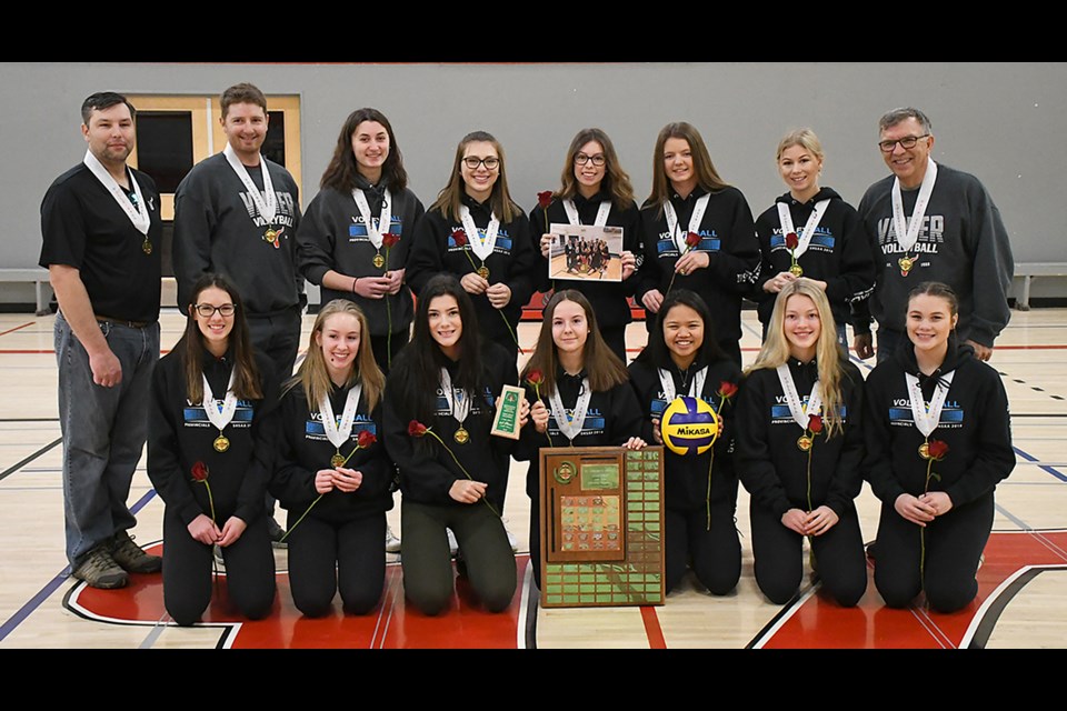 The Vanier Spirits gather for a team photo after a school assembly to honour their 4A girls volleyball provincial championship victory.