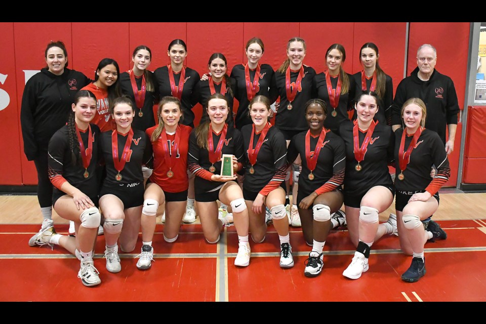 The Vanier Spirits gather for a team photo with their SHSAA 4A girls provincial bronze medals.