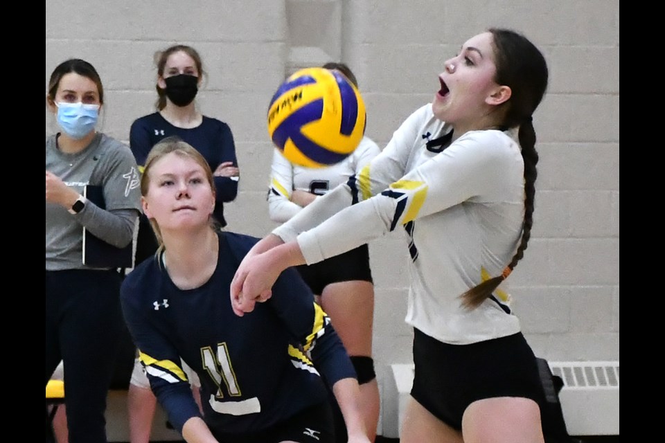 Action from the high school girls volleyball semifinal between the Central Cyclones and Briercrest Christian Academy Cougars.