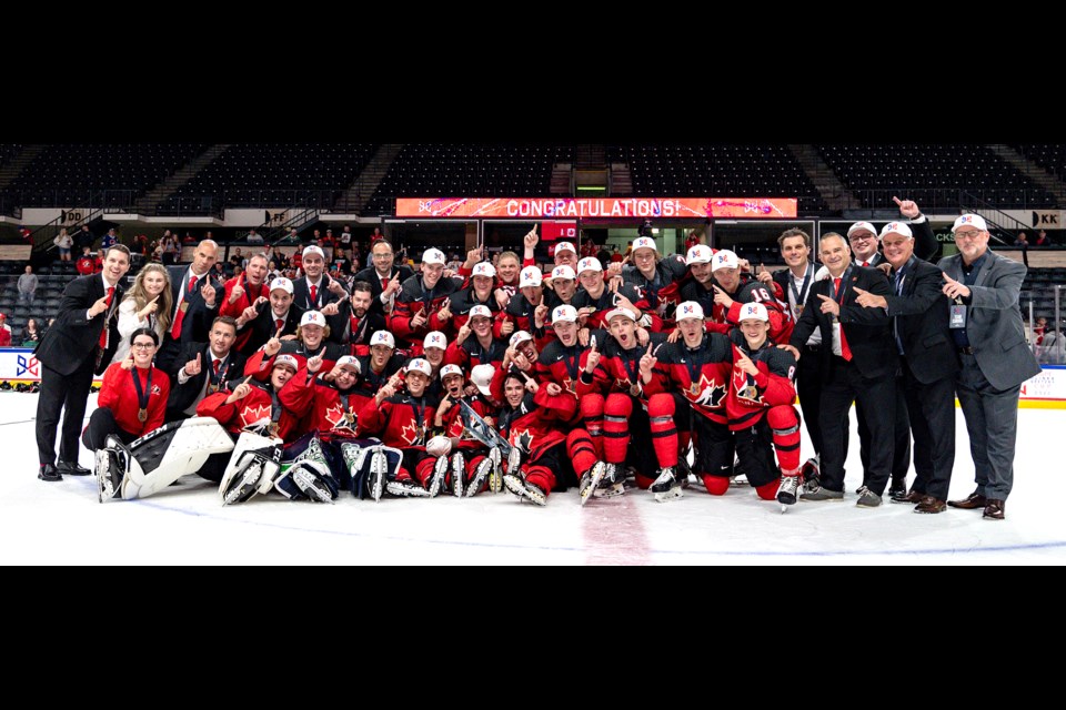 Team Canada -- including Moose Jaw Warriors forward Brayden Yager, front and centre wearing the ‘A’ -- celebrates after winning the Hlinka Gretzky Cup World U18 Hockey Championship. Former Warriors general manager and current Hockey Canada director of player personnel Alan Millar is at far right.
