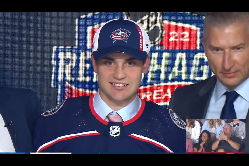Denton Mateychuk on stage at the 2022 NHL Draft with the Columbus Blue Jackets.