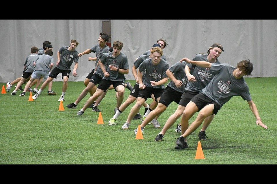 Members of the Moose Jaw Warriors work their way through the beep test during fitness testing on Wednesday afternoon at YaraCentre.