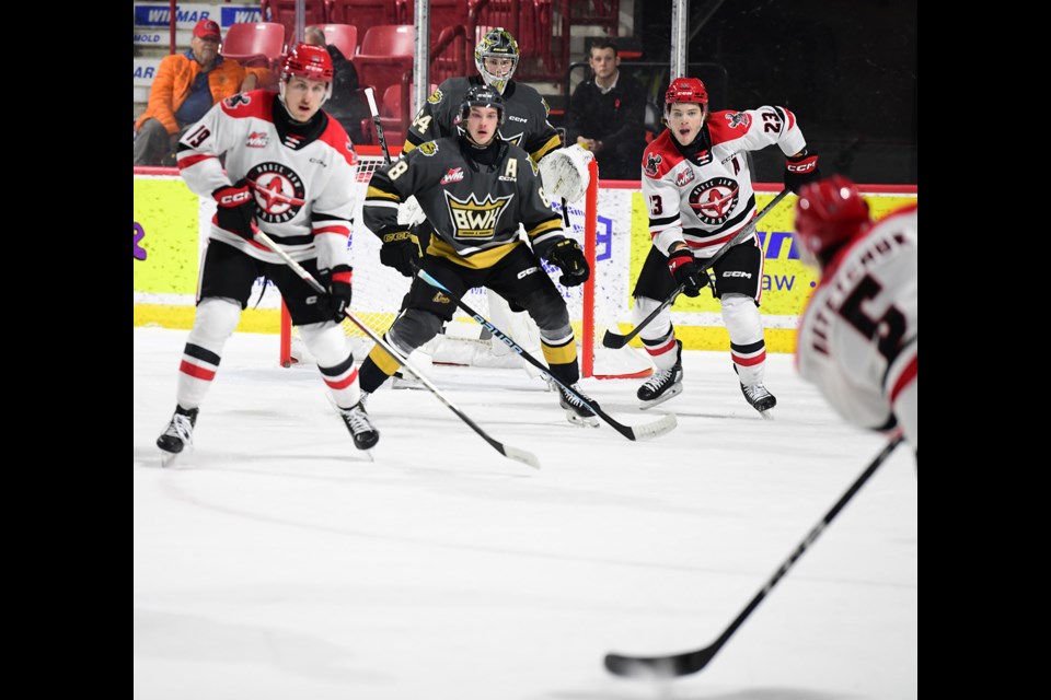 Warriors forward Atley Calvert (23) was in the right place at the right time to time home this point shot by Denton Mateychuk.