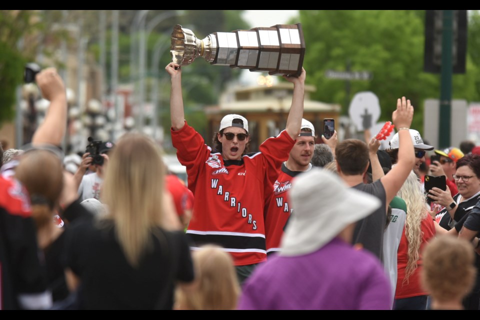 The Moose Jaw Warriors celebrate with their fans during the WHL championship parade and ceremony on Sunday afternoon in downtown Moose Jaw.