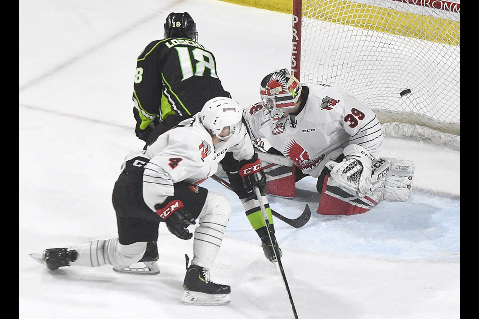 Edmonton's Vince Loschiavo scores the game-winning goal.