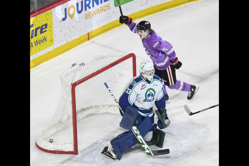 Ben Riche celebrates after Max Wanner’s power play goal midway through the first period.