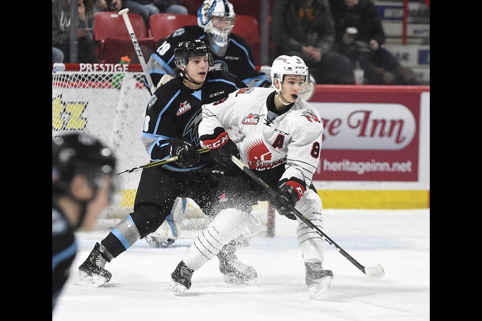 Justin Almedia battles for position in front of the Kootenay net. He finished the game with a goal and three assists.