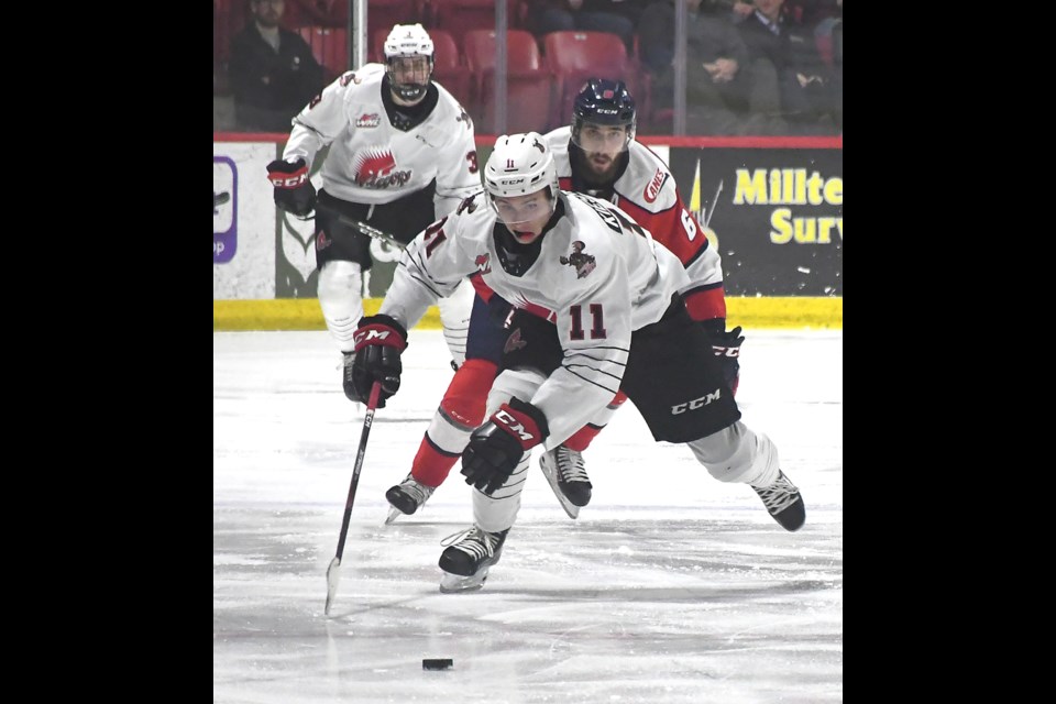 Bryden Kiesman leads the rush up-ice for the Warriors during second period action.