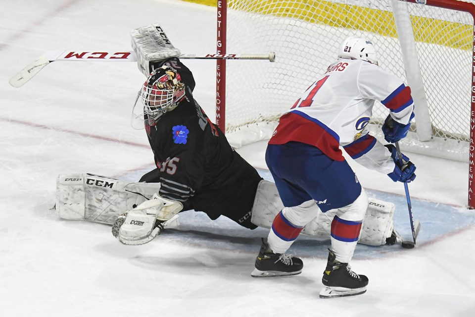 Warriors goaltender Carl Tetachuk gets his skate blade on this shootout attempt by Edmonton's Jake Neighbours.