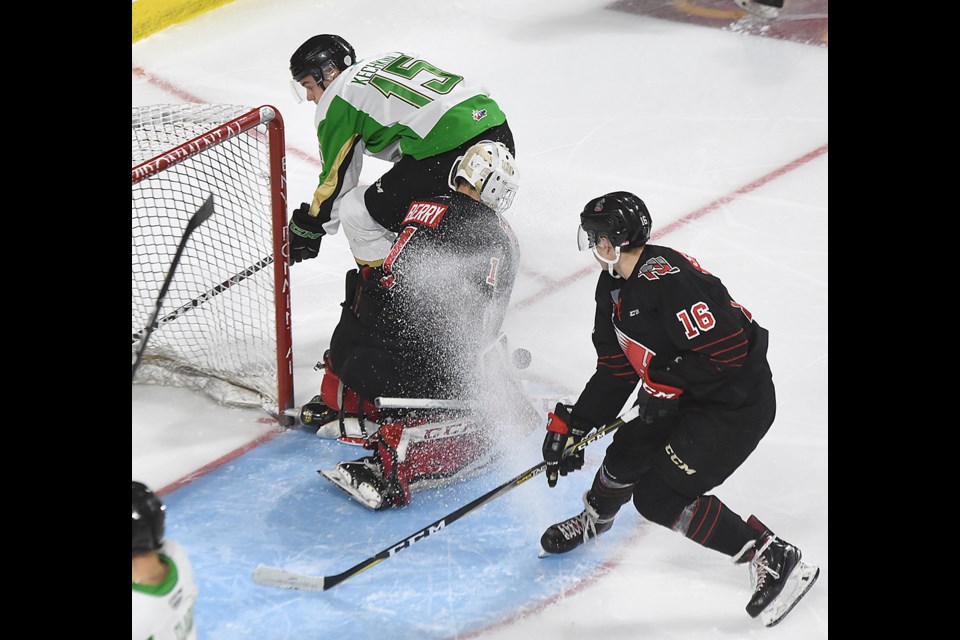 Jackson Berry turns aside an Ivan Kechkin scoring attempt as Daniil Stepanov covers the play.