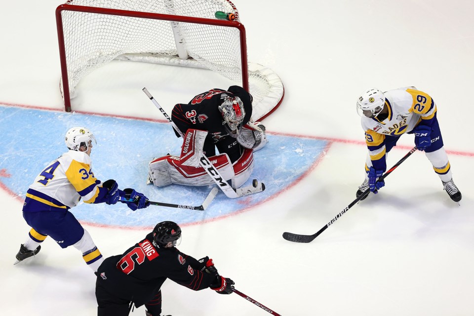 Boston Bilous makes a save with a pair of Blades on the doorstep.