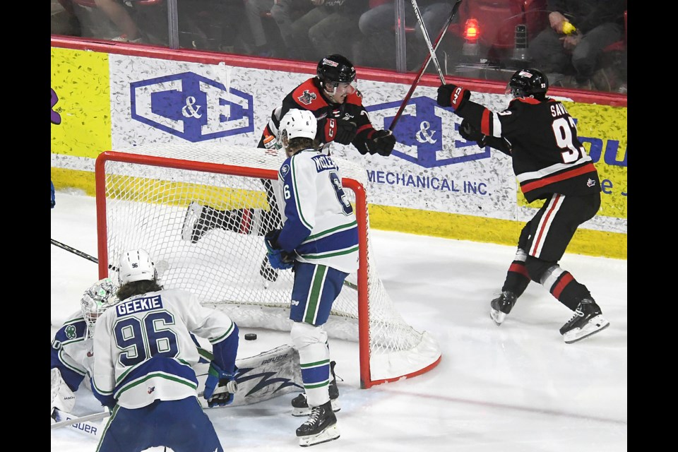 Brayden Yager celebrates the Warriors’ second goal with Matthew Savoie.