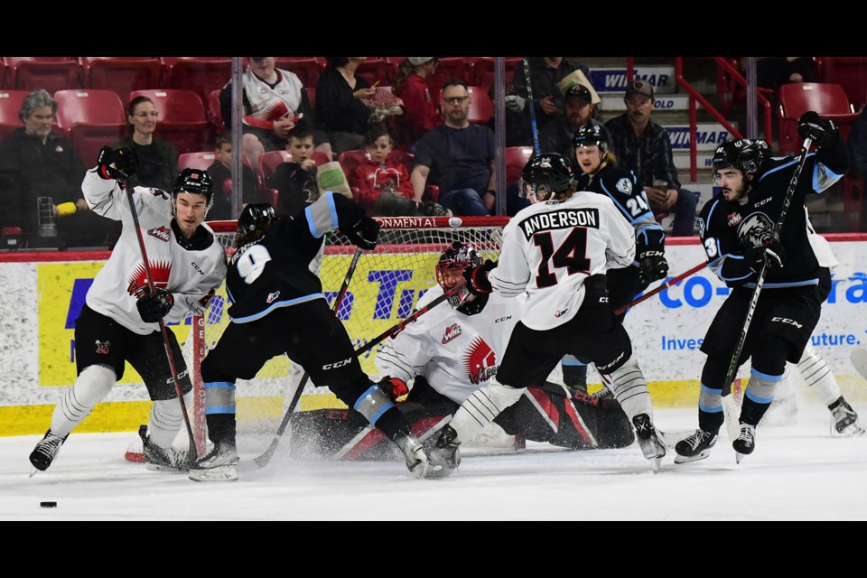 Jackson Unger made this first-period stop while battling through all sorts of traffic in front.