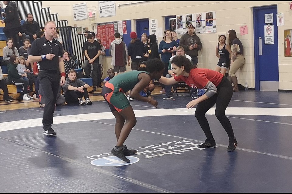 Peacock’s Miheret Cridland in action against Warman's Miriam Shah earlier this season.