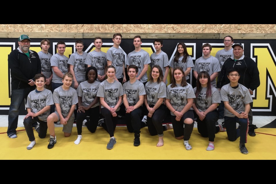 Members of the Moose Jaw high school wrestling team include Matthew Knox (front left), Kayce Owens, Miheret Cridland, Cassandra Bowles, Liam Vargo, Makayla Holmes, Alexis Bradish, Nigel Fang. Kelly Busch (coach, back left), Brennan Daradich, Tanner Stelgen, Jason Railton, Zarek Sand, Sam Eros, Zach Berardi, Ulrik Tondevold, Kayla Kwan, Connor Rowsell, Ethan Larose (assistant coach), Rob Villeneuve (coach).