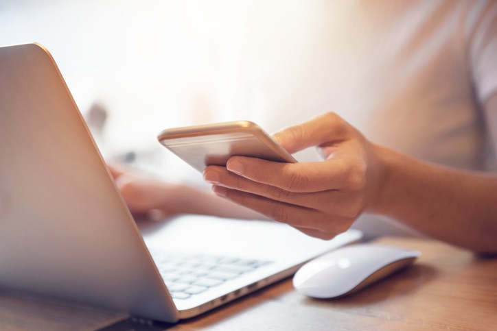 dialing phone laptop getty images