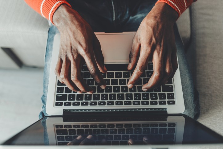 typing on laptop getty images