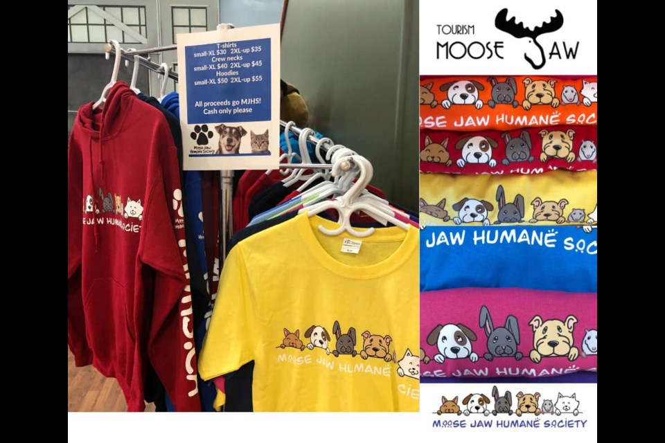 Moose Jaw Humane Society merchandise for sale at the Tourism Moose Jaw office on Diefenbaker Dr