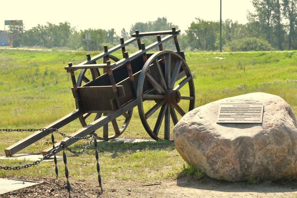 The newly installed Red River cart sits on display outside the Tourism Moose Jaw kiosk recently, honouring the historic role of Métis transportation across the Prairies. Darrell Hawman, president of the New Southern Plains Métis Local No. 160, hopes to make the site a dedicated space for Métis culture and heritage.