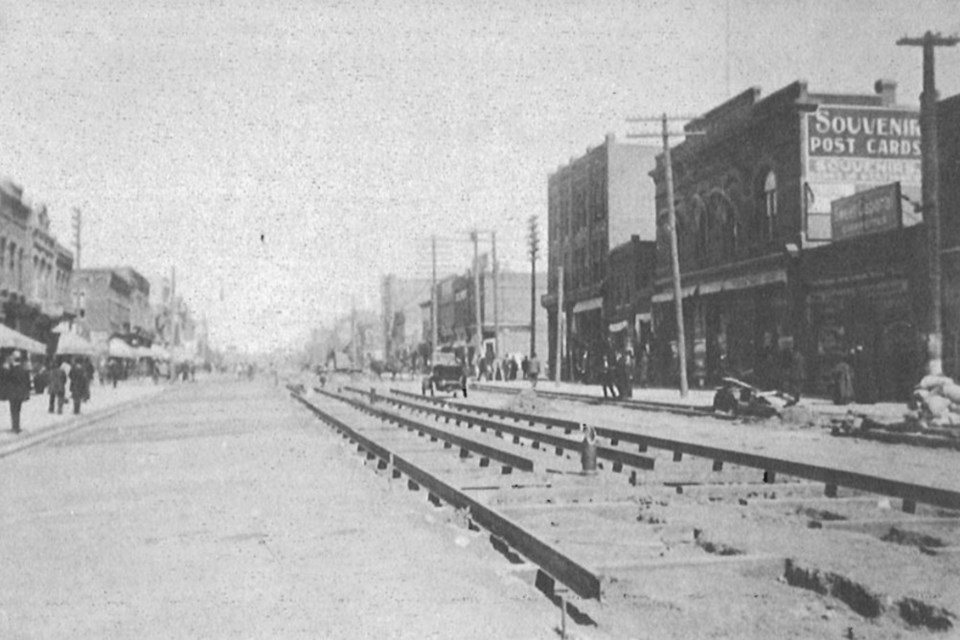 Crews lay track on Main Street looking north in 1911, part of the ambitious project that would open later that summer.