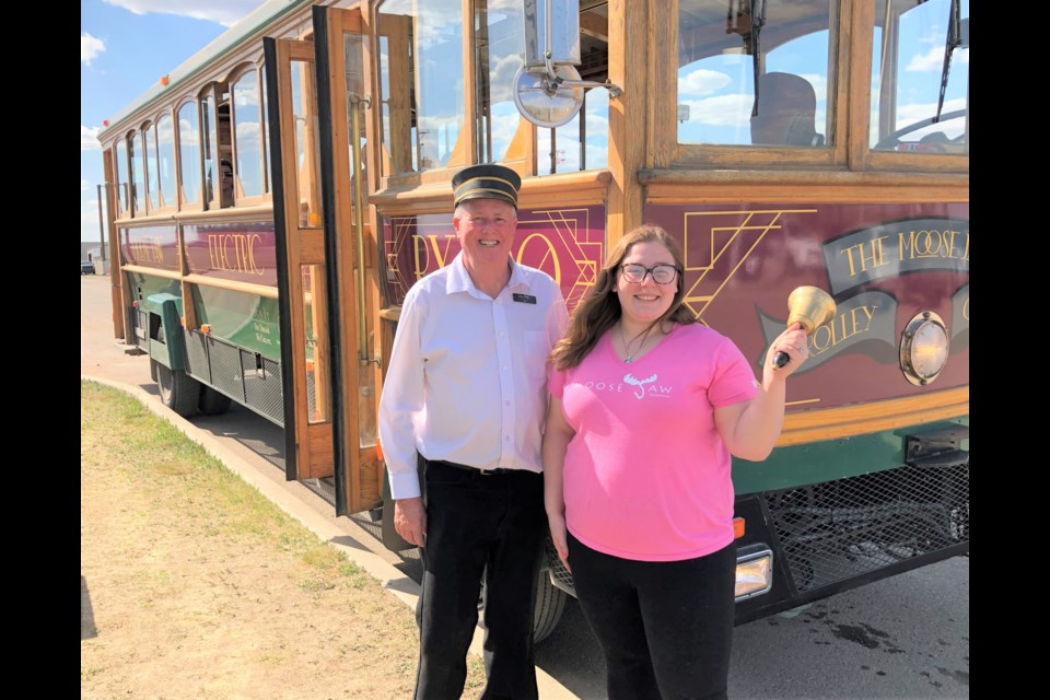 Trolley driver Ken Leys and trolley conductor Briana Janssen took groups of residents around the city on May 23, during a celebration at the Tourism Moose Jaw office to honour the trolley’s 20th season. Photo by Jason G. Antonio 