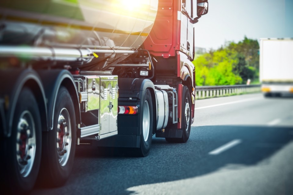 semi trailer driving highway shutterstock