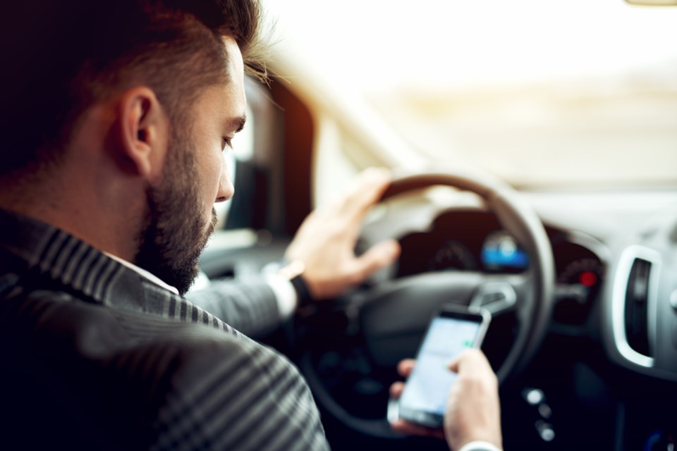 texting while driving shutterstock