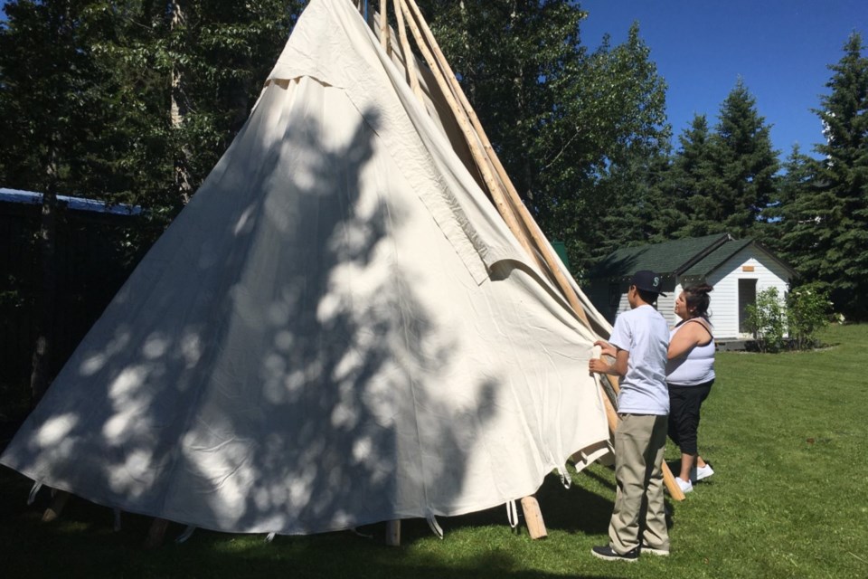 Before very long, the tipi started to take shape. Organizers and participants could not have hoped for better weather, as warm temperatures were tempered by a cool breeze. 
Simon Ducatel/MVP Staff