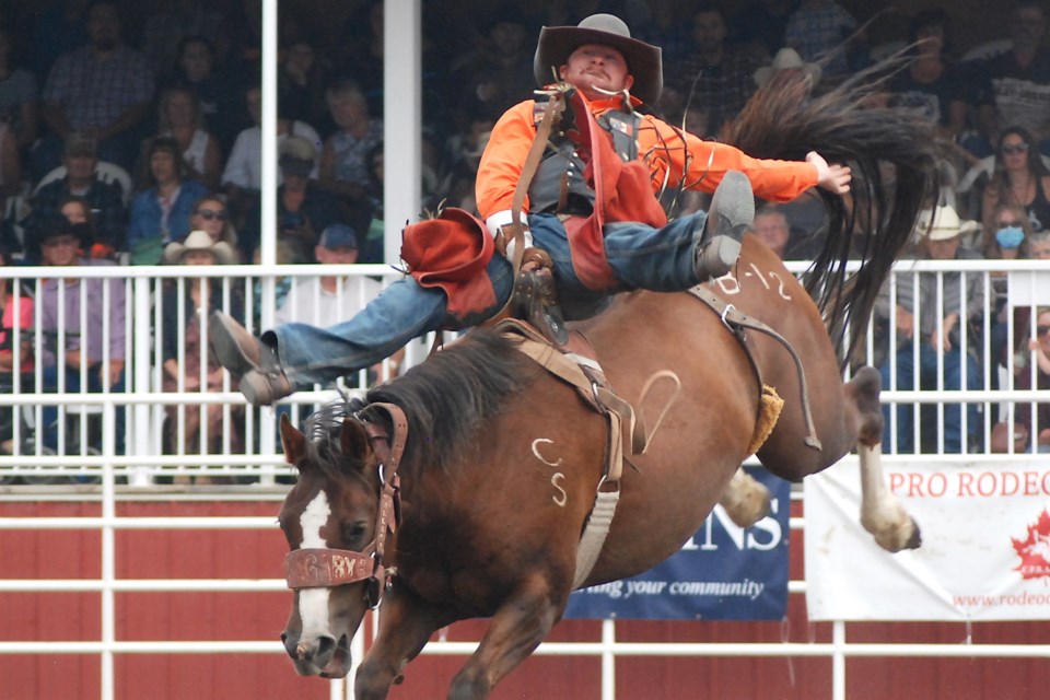 Strawbs Jones, from Duffield, Alta., scored 83 points after managing to hang in there, putting him in a second-place tie with Carstairs cowboy Jake Vold during Saturday’s bareback riding event. 
Simon Ducatel/MVP Staff
