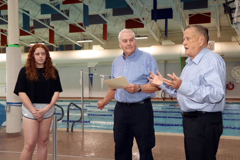 Bob Wardle (right) tells an appreciate audience his lifesaving story from 70 years ago as he and Gavin Bates (centre) prepare to give Innisfail's fourteen-year-old Aubry Haldorson (left) the 2021 Bates Wardle Award. Johnnie Bachusky/MVP Staff