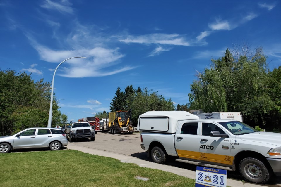 ATCO and local emergency responsers on 59th Street on June 25 following a reported natural gas leak on the property of mayoral candidate Glen Carritt. Submitted photo