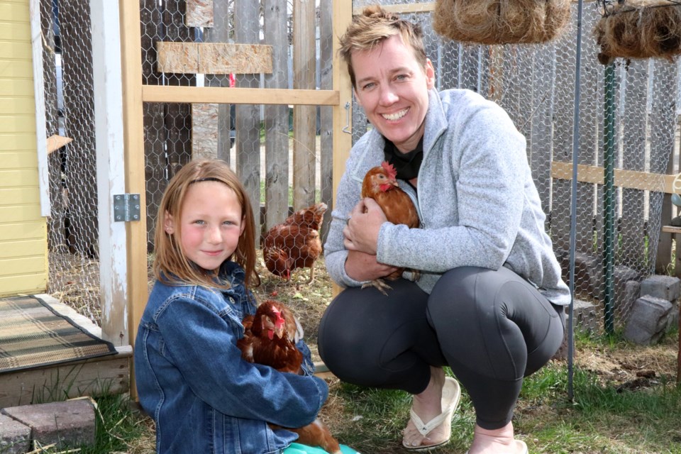 Lisa Reid and her granddaughter Izabelle were all smiles on May 11 when they brought their new urban hens home where they are now totally legal to raise in the Town of Innisfail. Johnnie Bachusky/MVP Staff