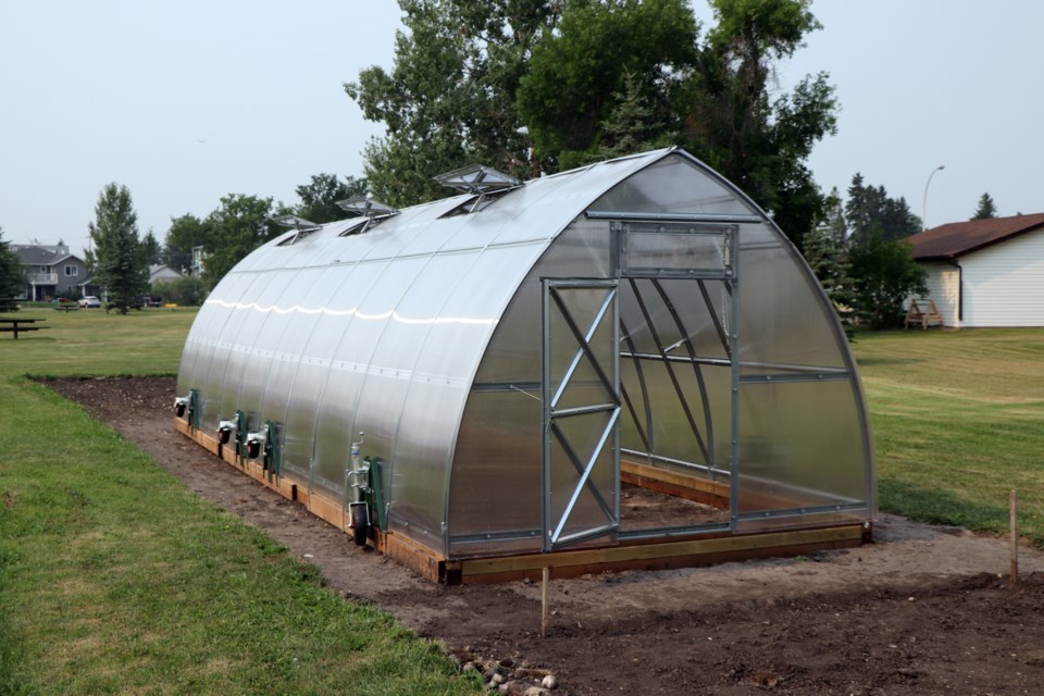 The new greenhouse at the Innisfail Community Garden. It was assembled last month by a group of committed volunteers. Johnnie Bachusky/MVP Staff