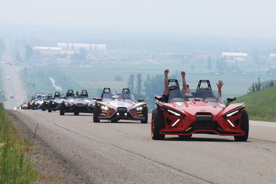 A convoy of roughly 20 Polaris Slingshots begins on Saturday, July 24 the second leg of the Sundre Slingfest’s poker rally, heading northbound on Hwy. 22 to explore the area after enjoying lunch in town. Like so many others, last year’s event was cancelled as a result of the COVID-19 pandemic. 
Simon Ducatel/MVP Staff