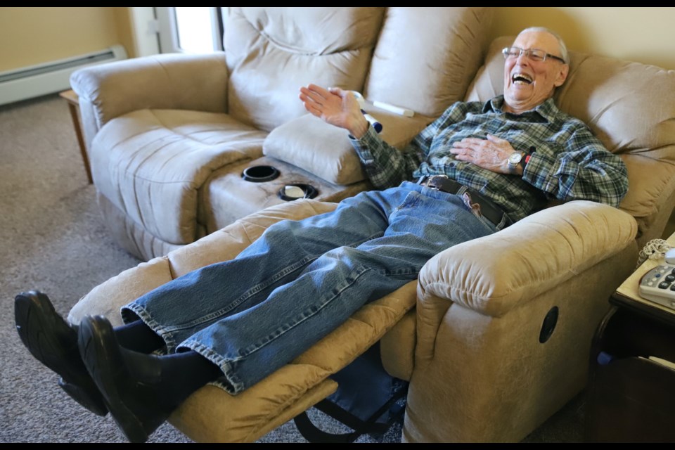 Bill Evans whips up the foot rest of his recliner.
