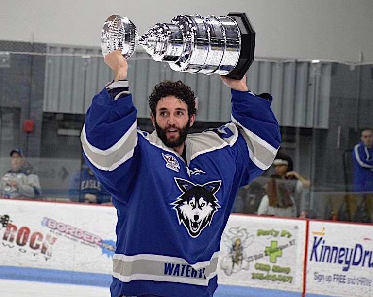 Sundre's Adam Beukeboom holds the Commissioner's Cup trophy following the Watertown Wolves' 3-2 double overtime victory over the Federal Prospects Hockey League's River Dragons from Columbus, Ga. 
Submitted photo