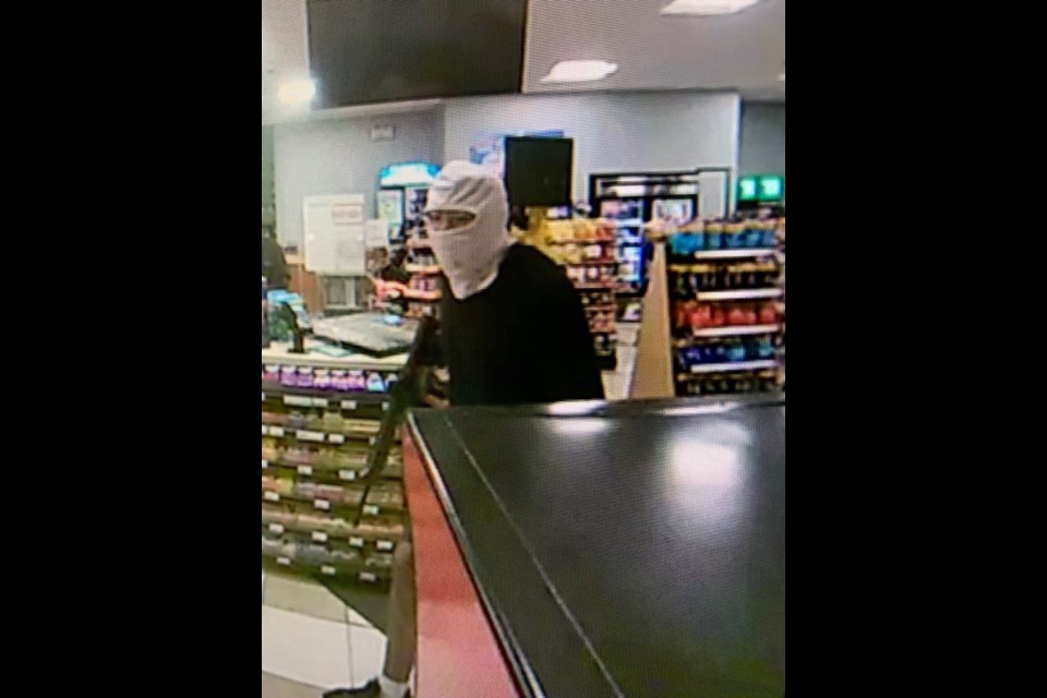 The Innisfail RCMP department received on Thursday, Aug. 26 at about 11:23 p.m. an emergency call following a reported armed robbery at a convenience store. Mounties are turning to the public for help in the hopes of identifying the lone masked suspect.
Photo courtesy of RCMP 
