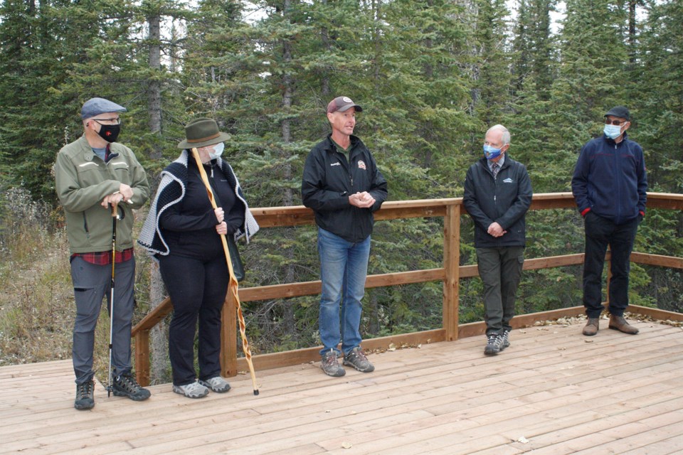 Mike Beukeboom, centre, who was inspired by a nature boardwalk he'd seen in the vicinity of Mount Washington on Vancouver Island, has for years been working toward an educational boardwalk in Sundre near the Visitor Information Centre behind the berm along a looping trail that reaches the Red Deer River's east bank. 
Simon Ducatel/MVP Staff