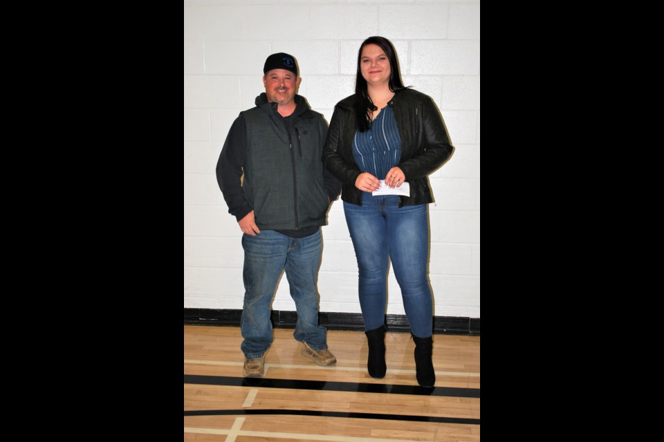 Agricultural Society Scholarships: This award is given to students who have earned their diploma for the Green Certificate Program. This scholarship, provided by the Bowden and District Ag Society, consists of $200 to be put toward post-secondary education. From left is Keith Bailey, president of the Bowden and District Ag society and recipient Rebecca Heit. Missing from photo: recipient Kevin van der Rijt. Photo by Karen Fagan