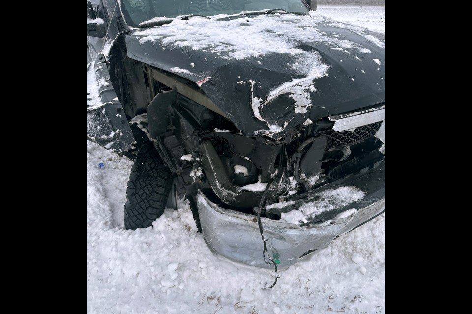 The badly damaged front end of Sheryl Knock's 2012 Dodge Ram 1500 pickup truck following the Highway 2 crash with a hit and run driver on March 20. 
Submitted photo