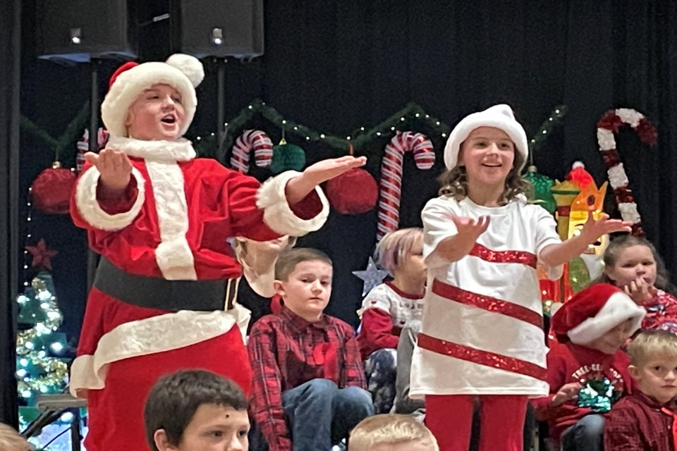 Santa Claus and the Red Candy Cane sing their story during the holiday season musical, Christmas on Candy Cane Lane, that was presented at Innisfail's École John Wilson Elementary School on Dec. 21. 
Johnnie Bachusky/MVP Staff