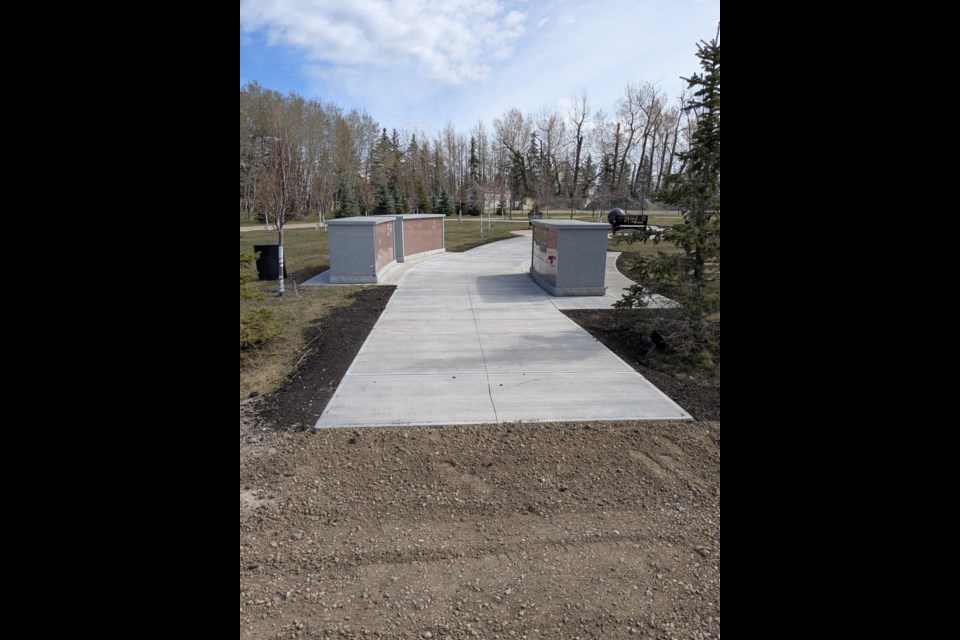 This concrete pathway leads to and beyond the columbarium area of the cemetery.
Photo submitted