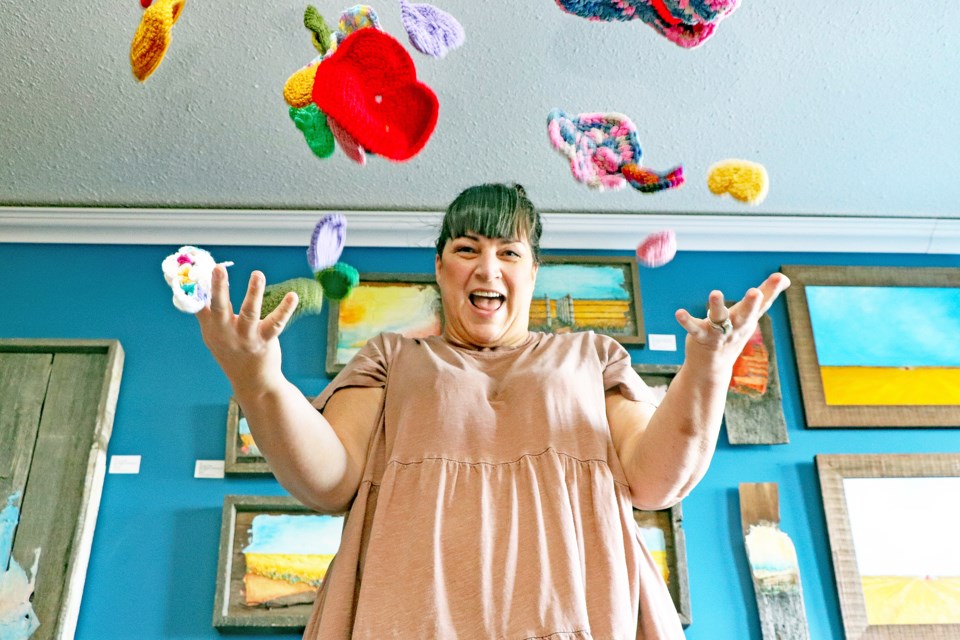 Crochet bombs are already falling by the hundreds for Innisfail artist Karen Scarlett's Community Crochet BOMB Project that will be unveiled on Installation Day on Saturday, June 3 along the chain link fence between Autumn Grove and the Innisfail Health Centre. Johnnie Bachusky/MVP Staff