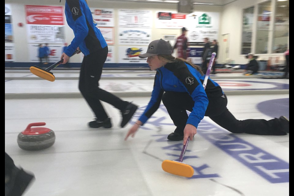 Izzy Poland, from Okotoks, throws a rock on Friday, Feb. 2 during a U15 Alberta Curling qualifier hosted at the Sundre Curling Club. The Okotoks rink placed fourth, earning the team a spot at provincial playdowns later this month in Lacombe.
Simon Ducatel/MVP Staff