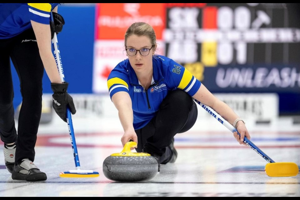 Former Sundre curler Danielle Schmiemann, who was playing third on Team Sturmay at the 2024 Scotties Tournament of Hearts, throws during the competition that was hosted
Feb. 16-25 in Calgary at the Winsport Event Centre.
Photo Courtesy of Andrew Klaver