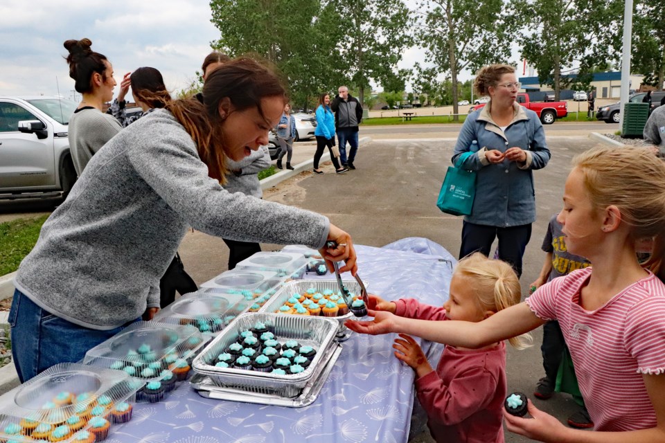 Dr. Natasha Hansen hands out treats to children during the triple celebration at the Day Dental Professional Building on June 17th. Johnnie Bachusky/MVP Staff